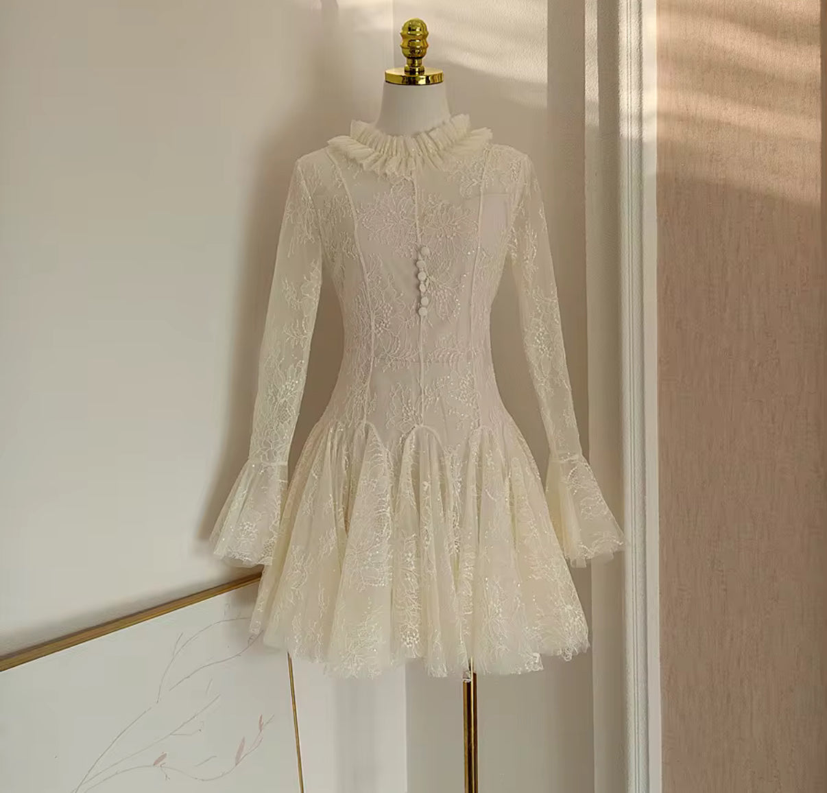 Sheer lace mini dress with ruffles