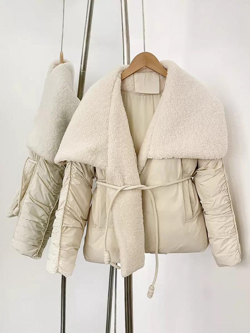 Elegant padded coat with a rich fur finish