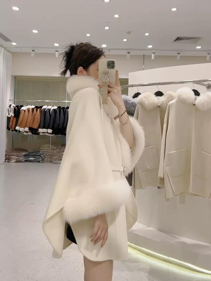 Luxurious wool cape coat with belted waist and plush fur trim