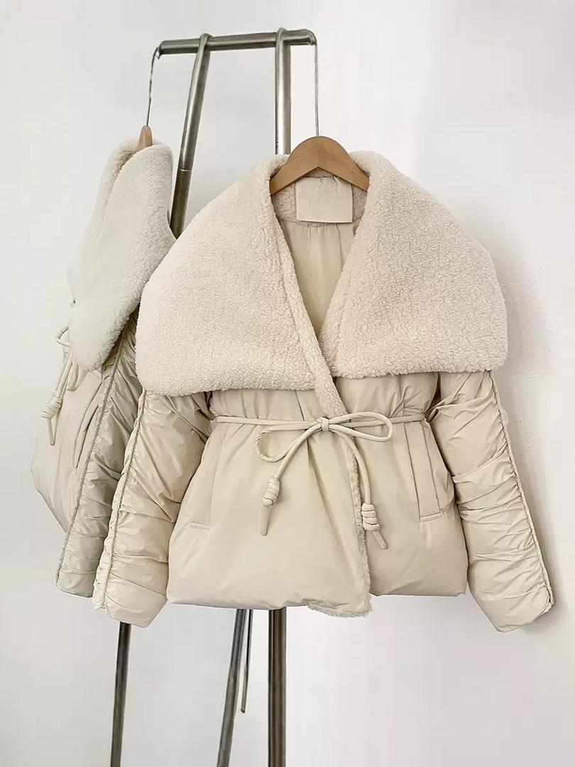 Elegant padded coat with a rich fur finish