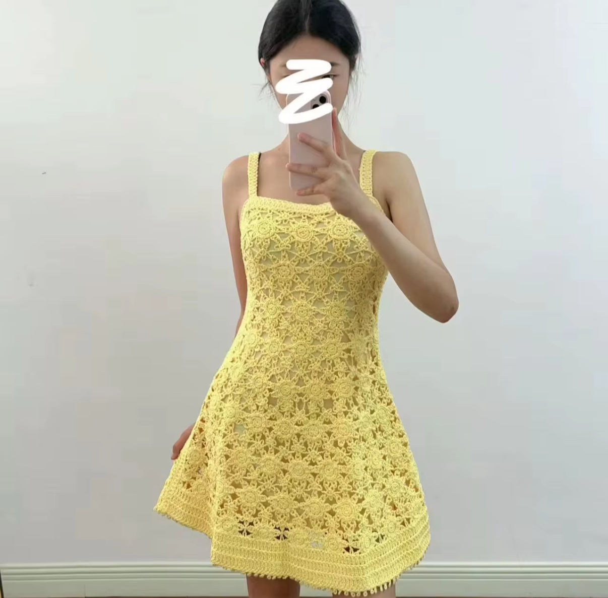 Yellow crochet mini dress with floral detailing