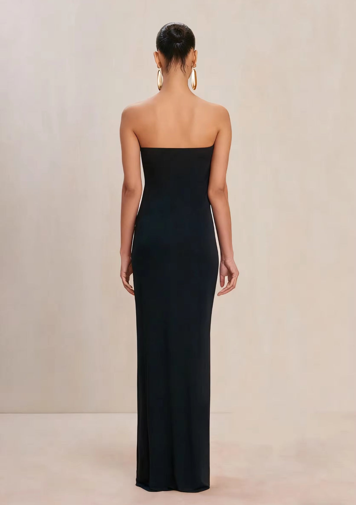 Strapless black column dress with metallic accent detail