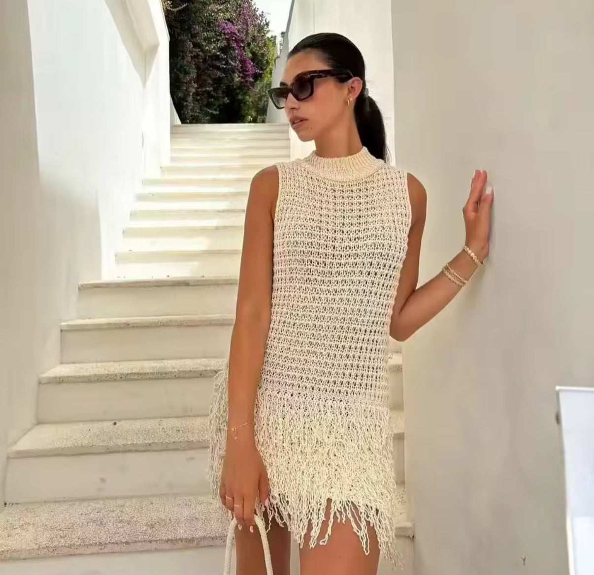 Beige knit mini dress with layered fringe hem