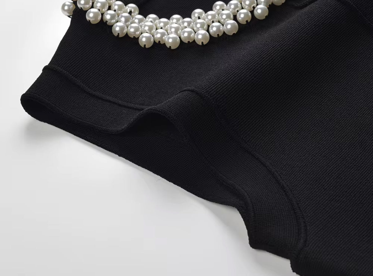 Sleeveless Black Mini Dress with White Ruffle Hem