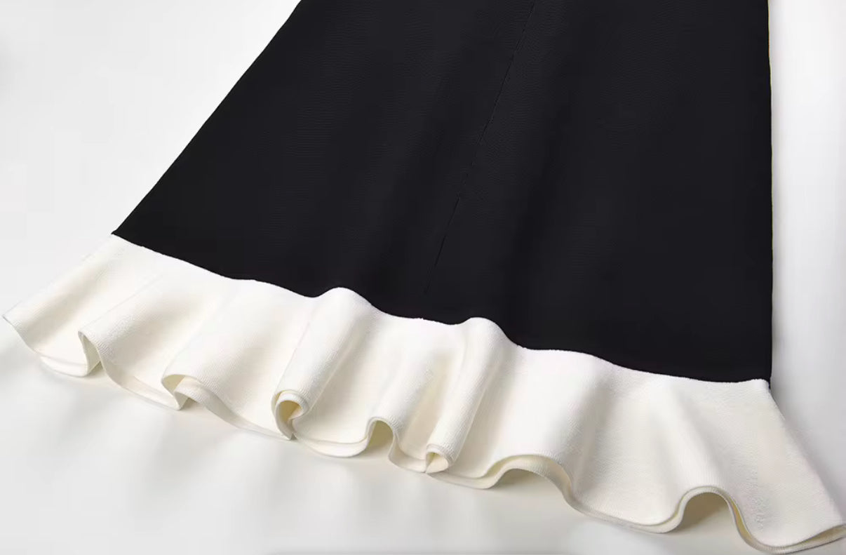 Sleeveless Black Mini Dress with White Ruffle Hem