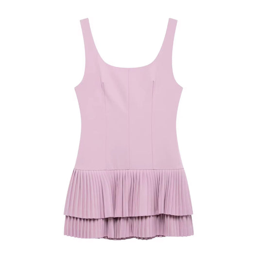 fitted bodice with a playful pleated layered hem dress
