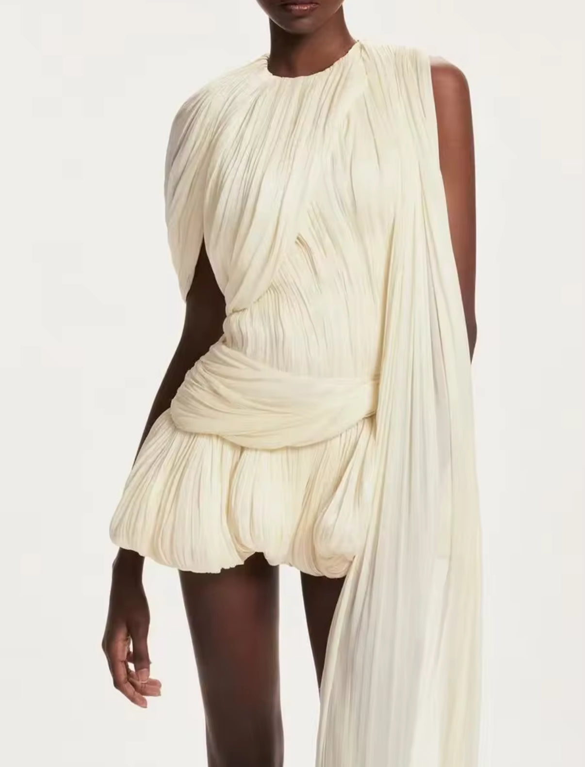 White draped mini dress with flowing cape sleeve