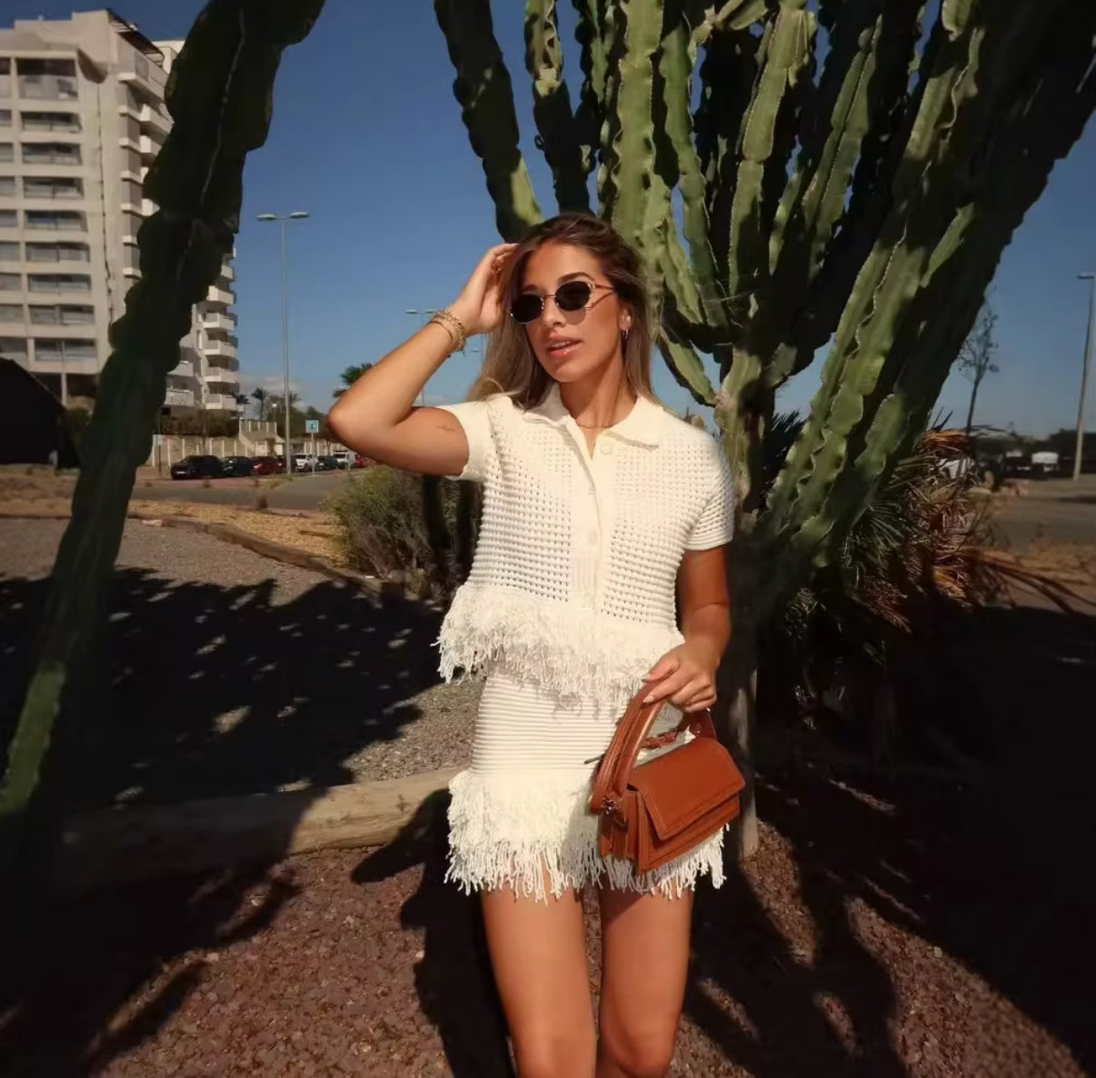 Crochet crop top and mini skirt with fringe accents