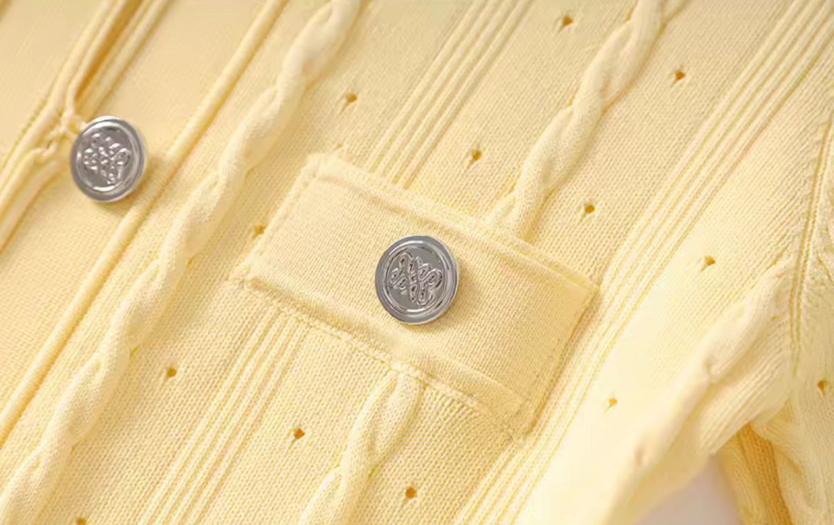 Pastel knit midi dress with front buttons and pocket detail