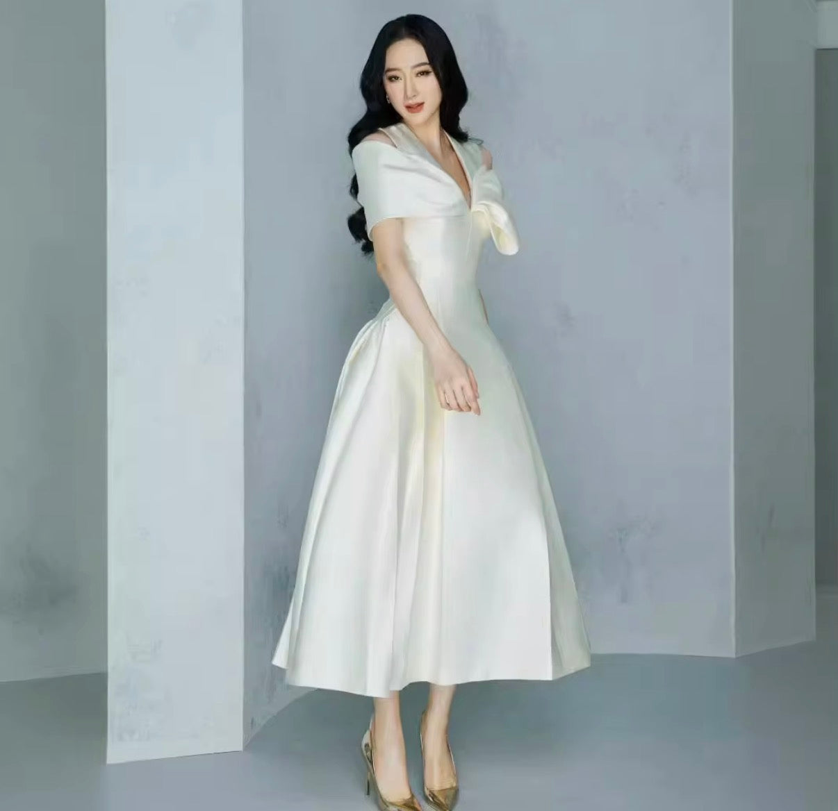 Elegant Off-Shoulder Ivory Midi Dress with Sculpted Draped Bow Neckline