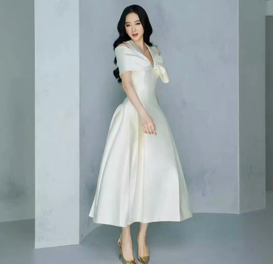 Elegant Off-Shoulder Ivory Midi Dress with Sculpted Draped Bow Neckline