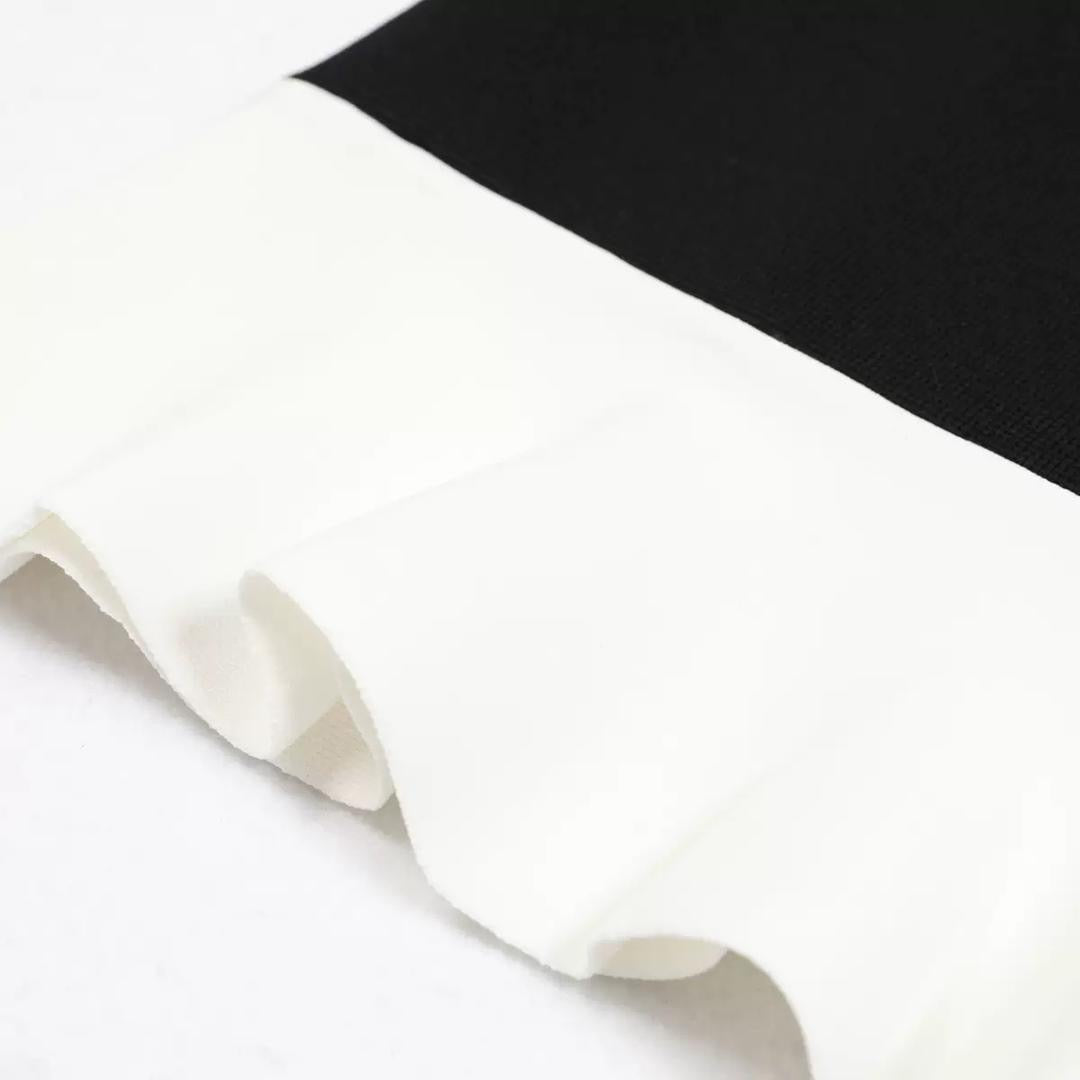 Sleeveless Black Mini Dress with White Ruffle Hem