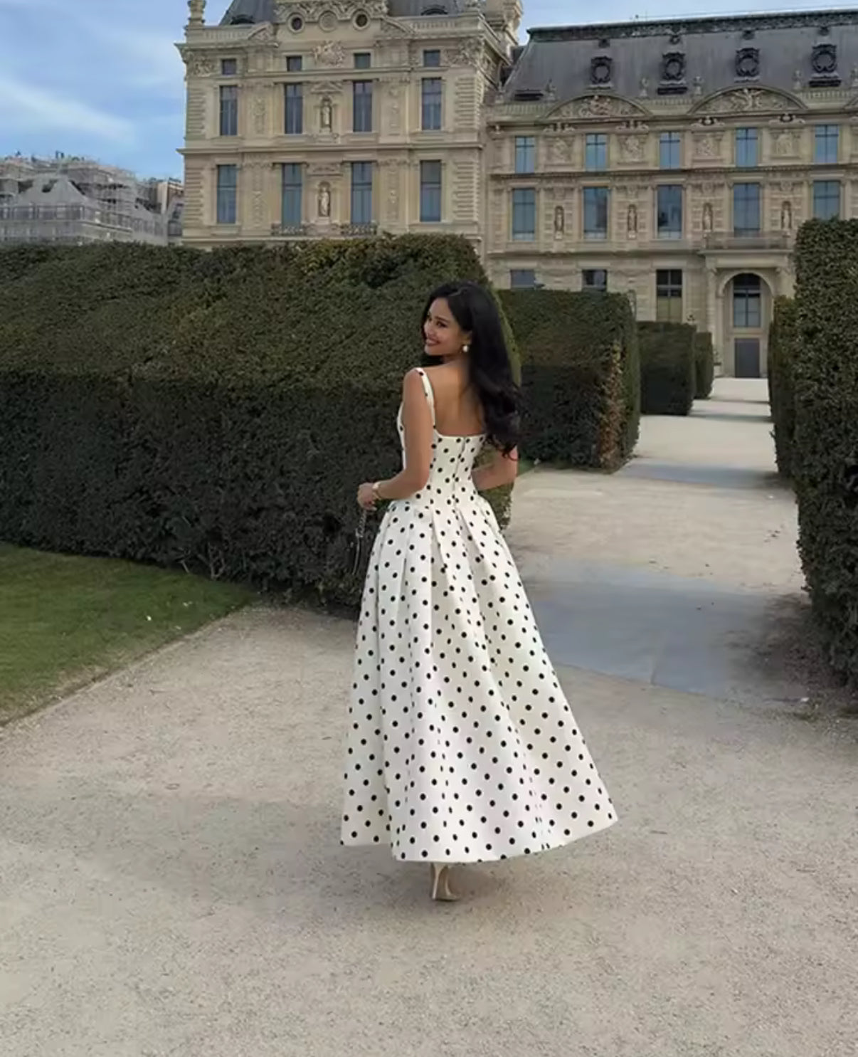 White A-line maxi dress with black polka dots