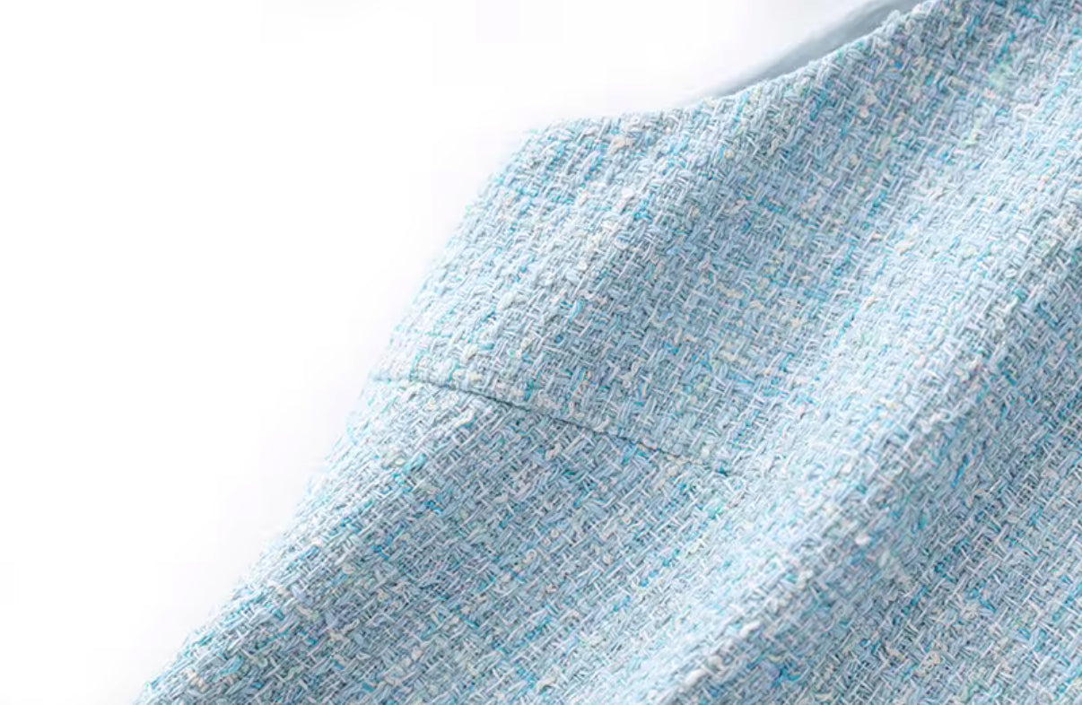 Baby blue tweed mini dress with crystal buttons