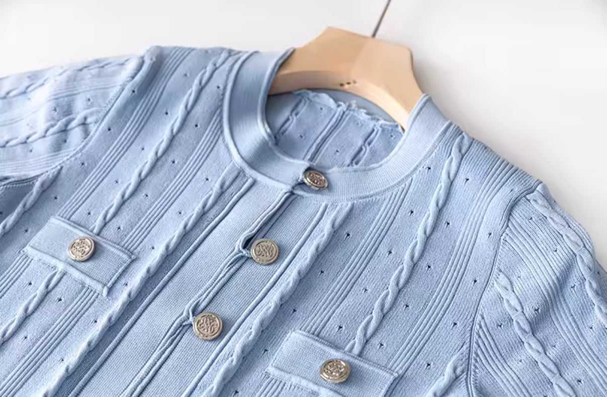 Pastel knit midi dress with front buttons and pocket detail