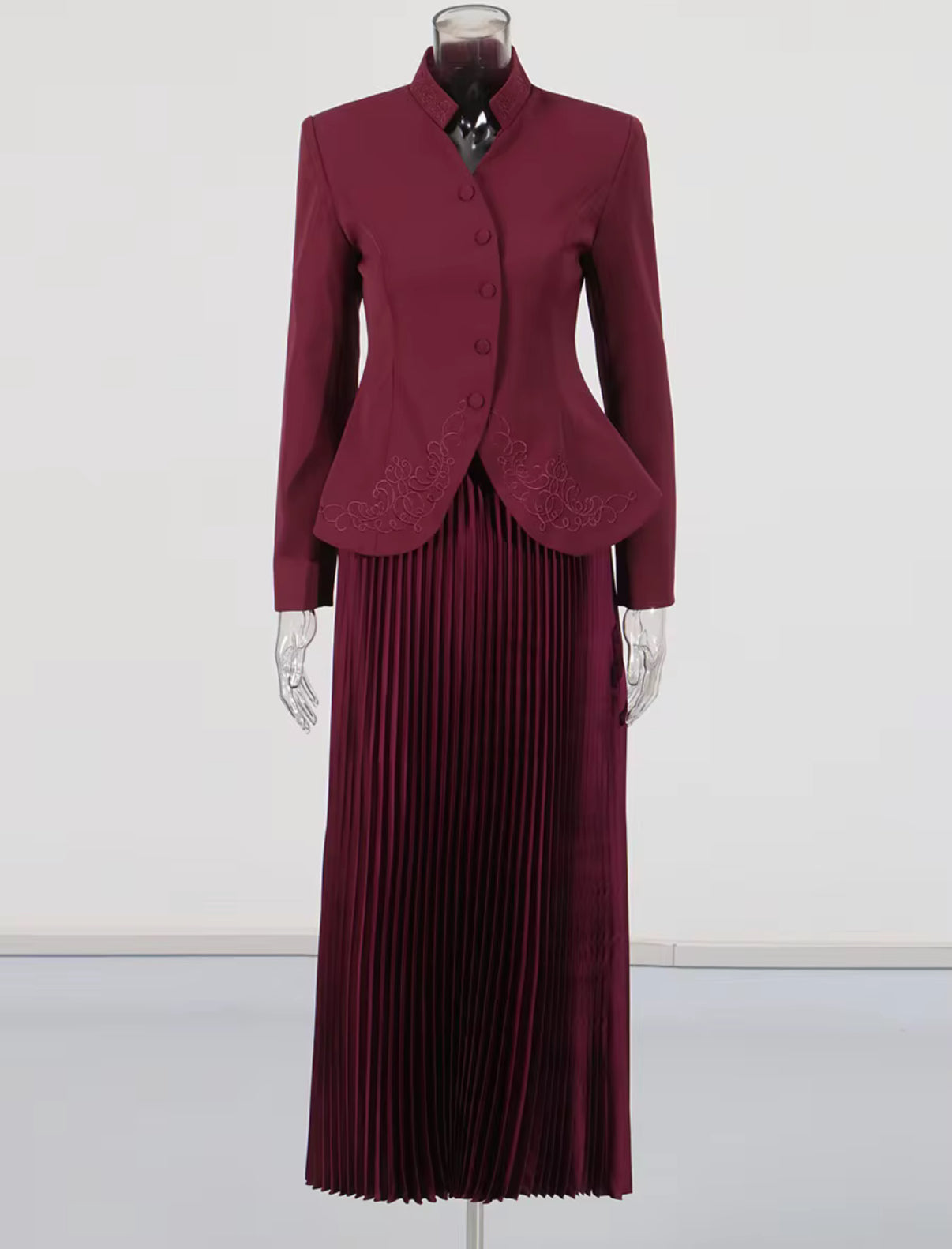 tailored blazer with flowing pleated maxi skirt