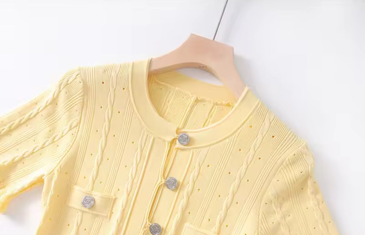 Pastel knit midi dress with front buttons and pocket detail