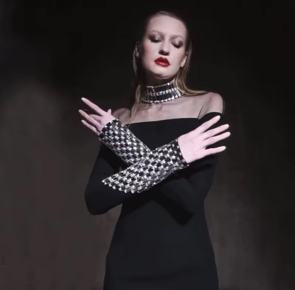 Black off-shoulder dress with crystal-embellished sleeves