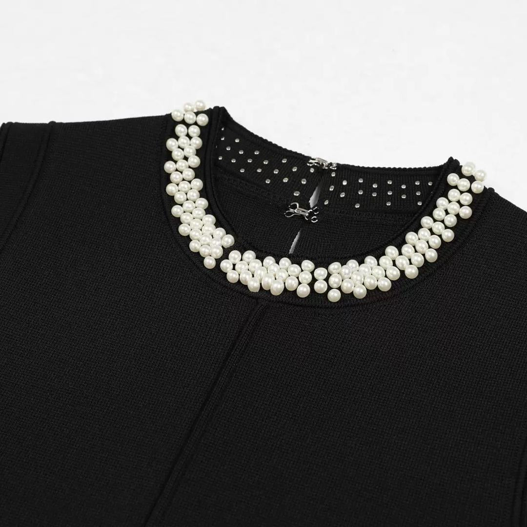 Sleeveless Black Mini Dress with White Ruffle Hem