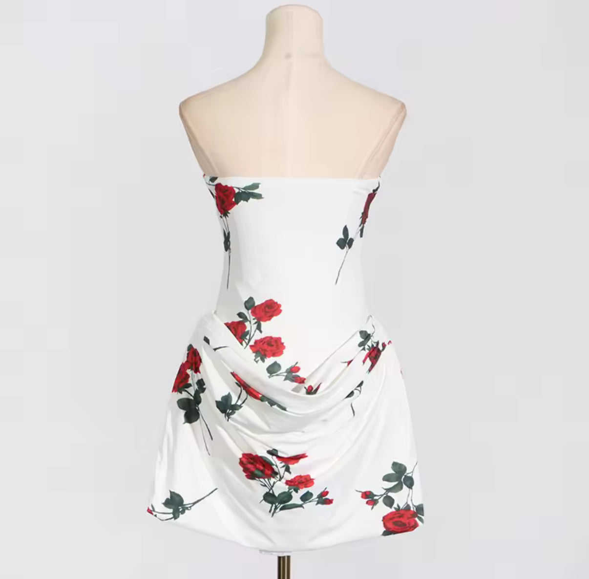 White Strapless Mini Dress with Red Rose Print and Draped Skirt Detail