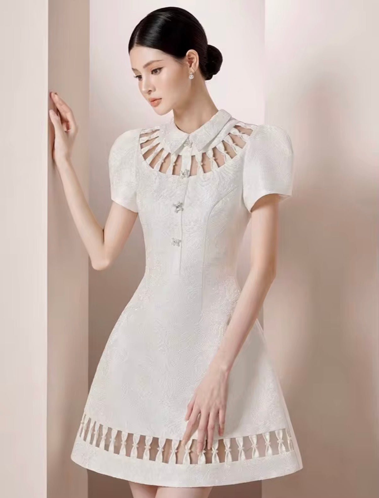 Elegant Textured Mini Dress with Cutout Collar and Sculpted Puff Sleeves