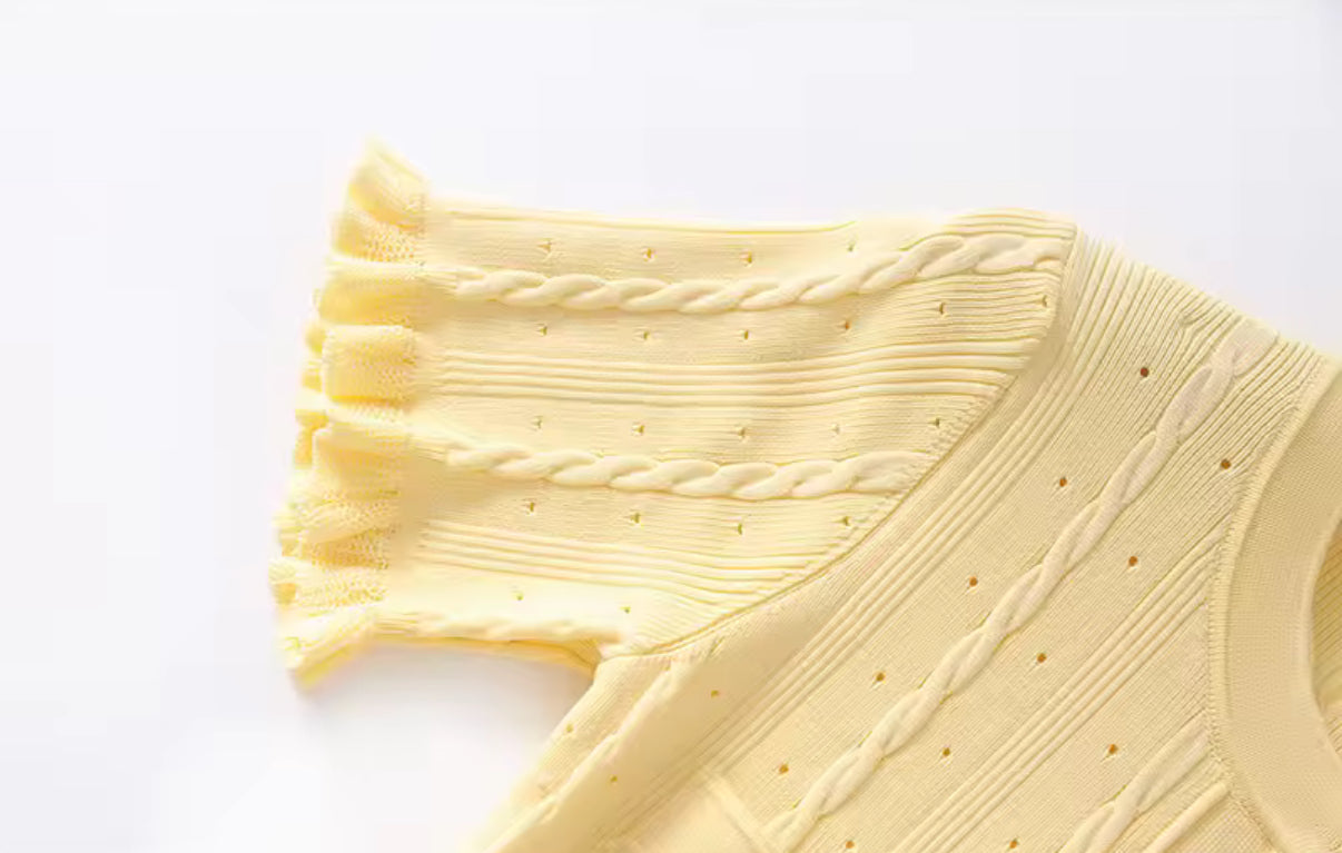 Pastel knit midi dress with front buttons and pocket detail