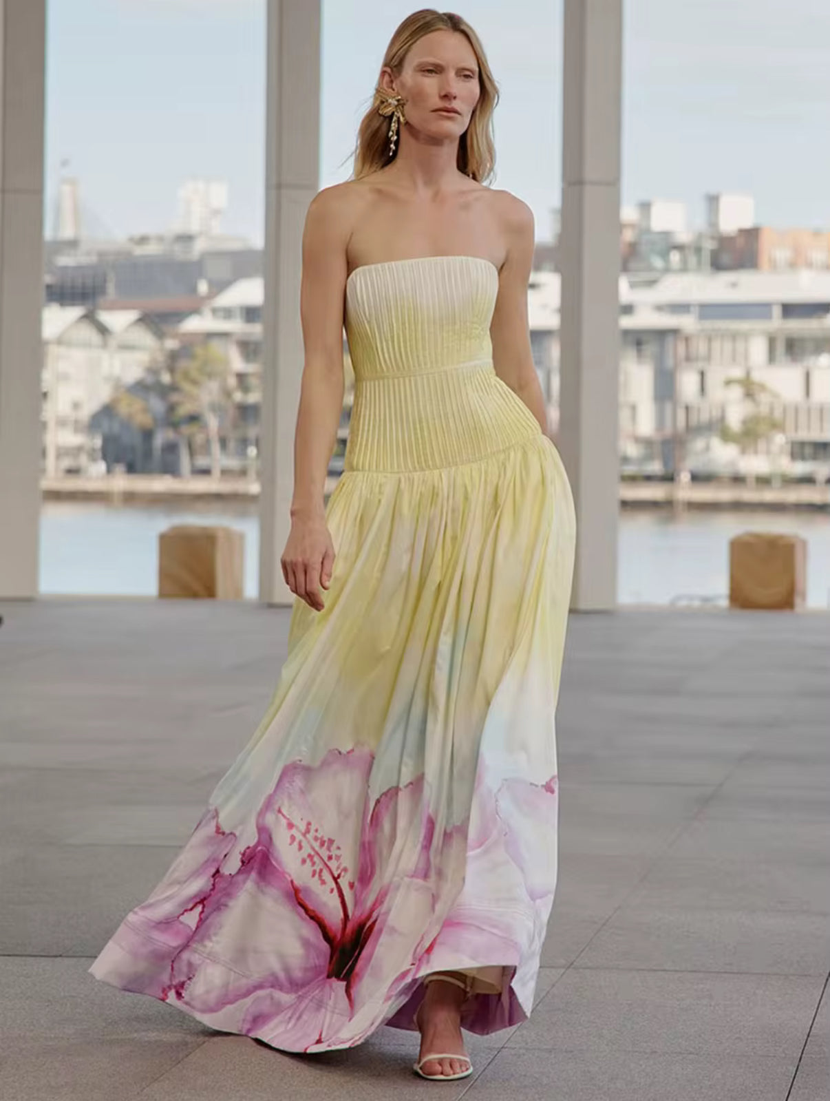 Yellow strapless maxi dress with pink floral hem