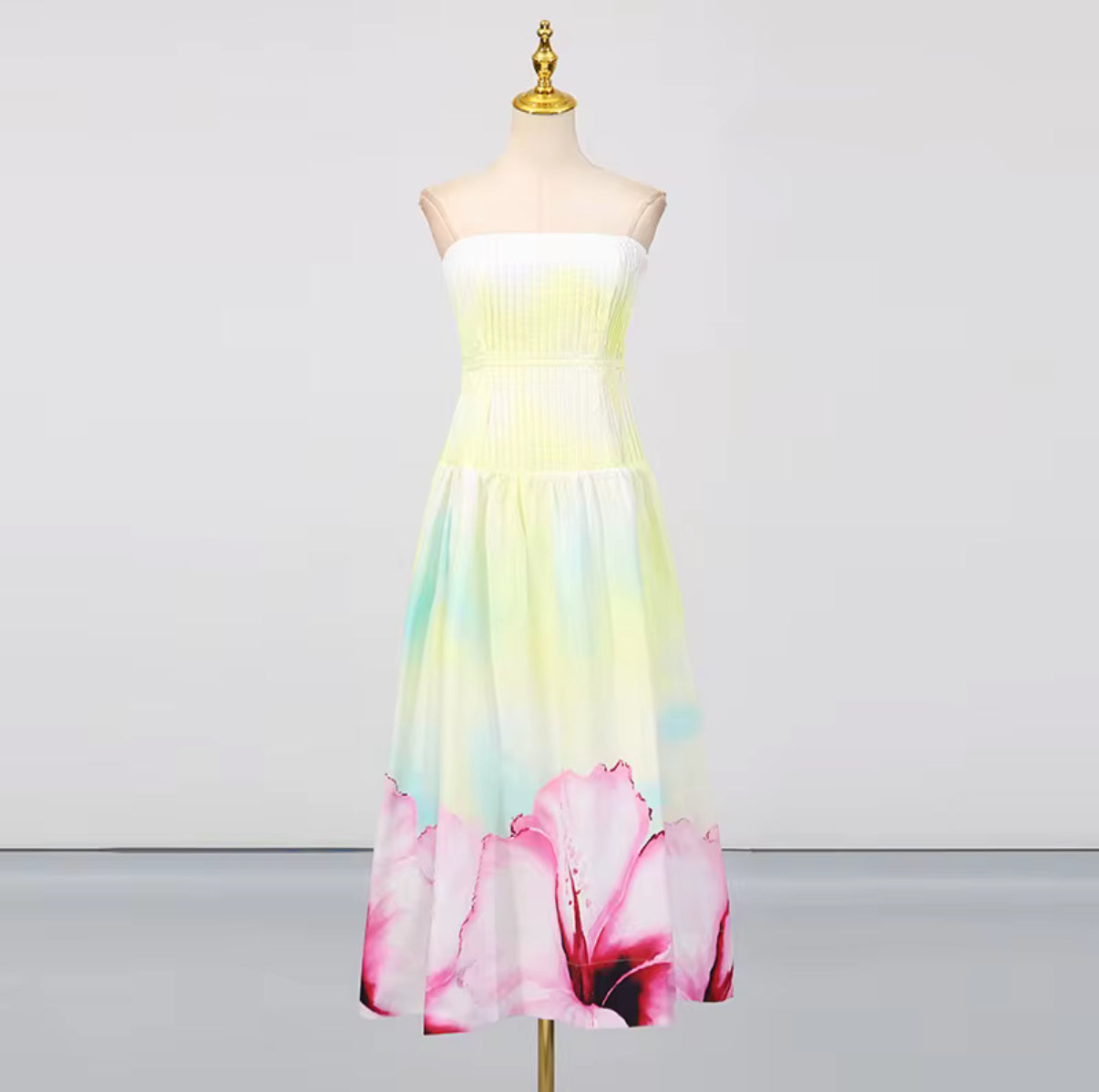 Yellow strapless maxi dress with pink floral hem