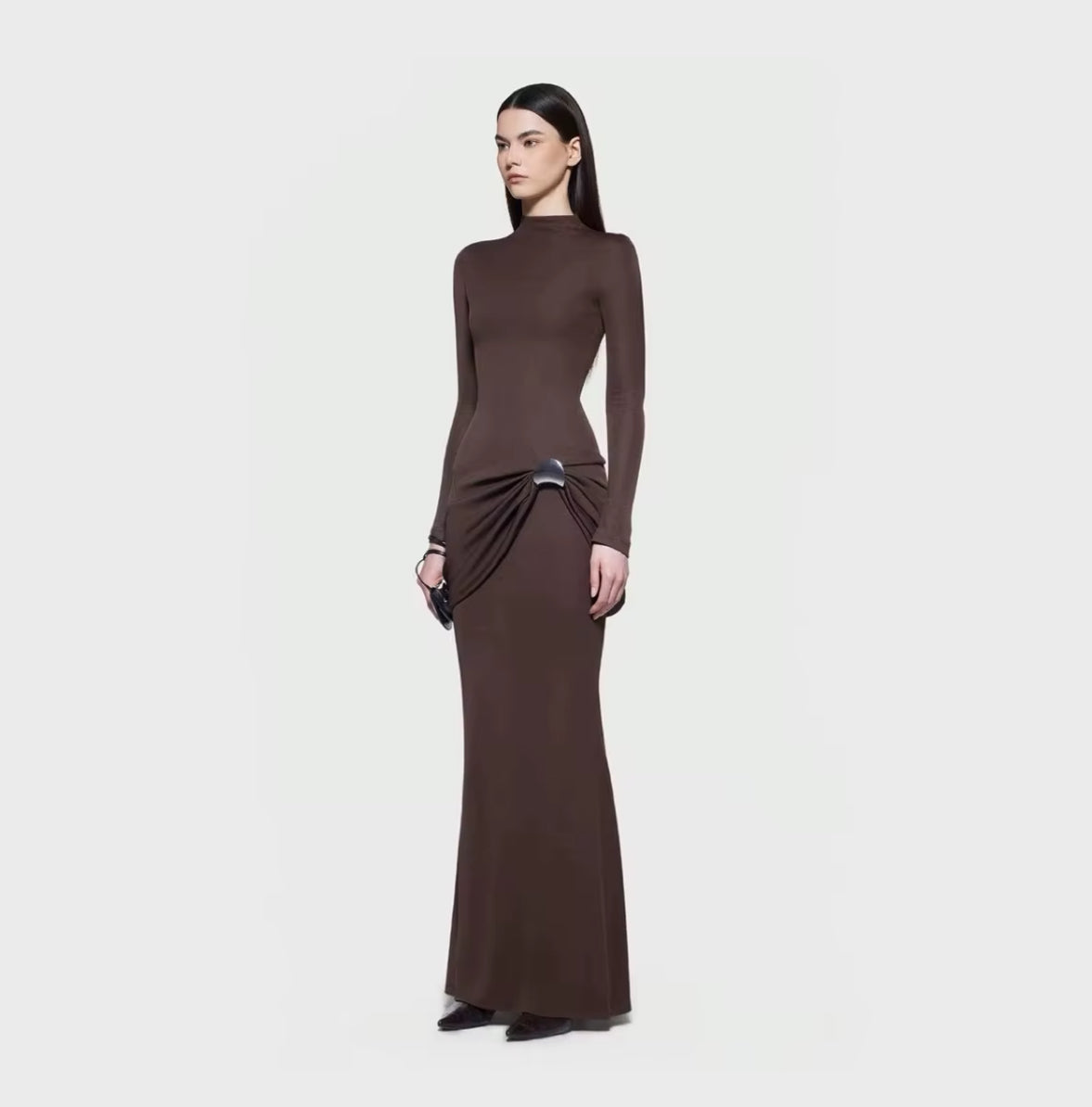 High neckline with minimalist sophistication