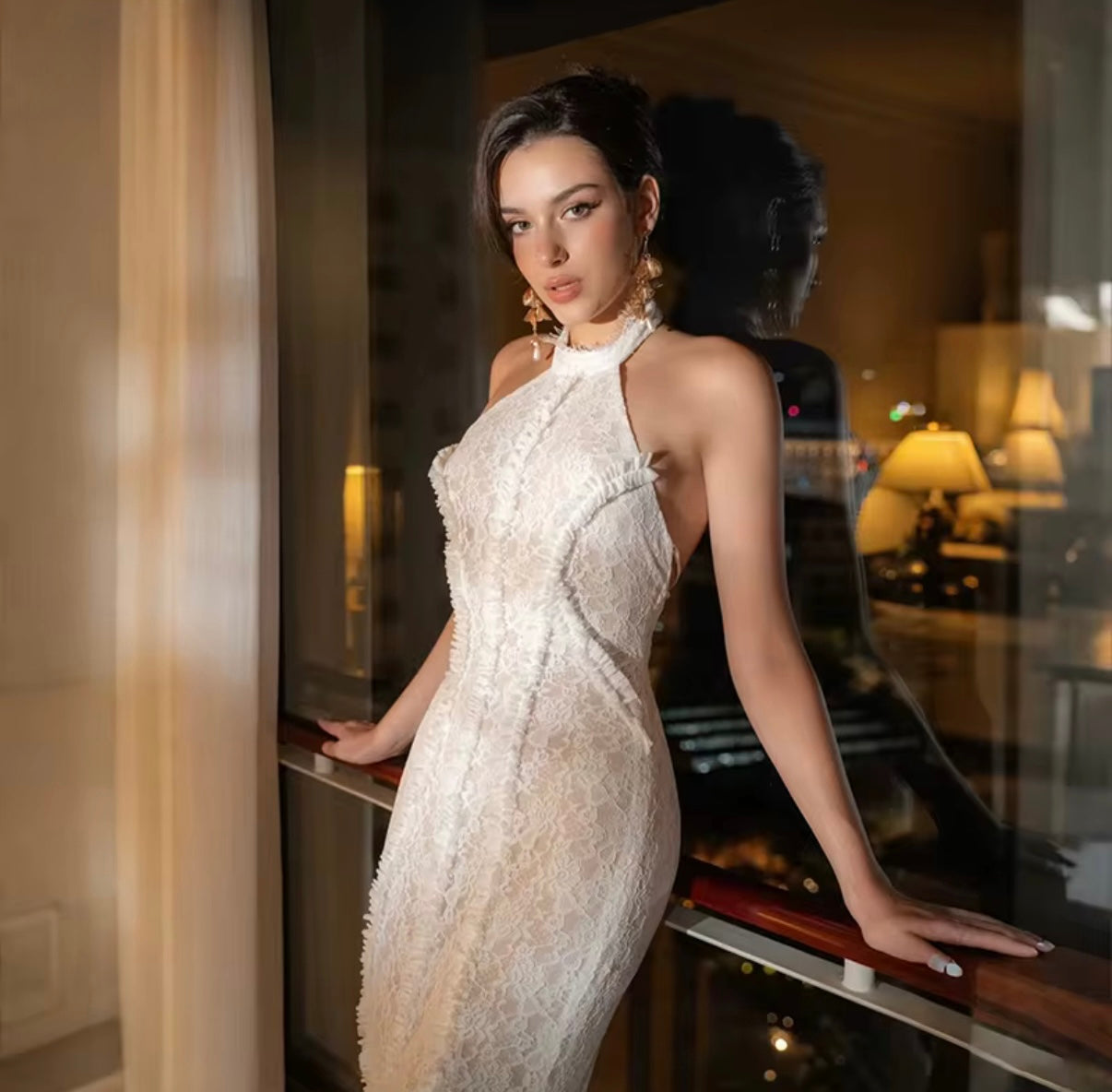 Elegant white maxi dress with sheer lace finish