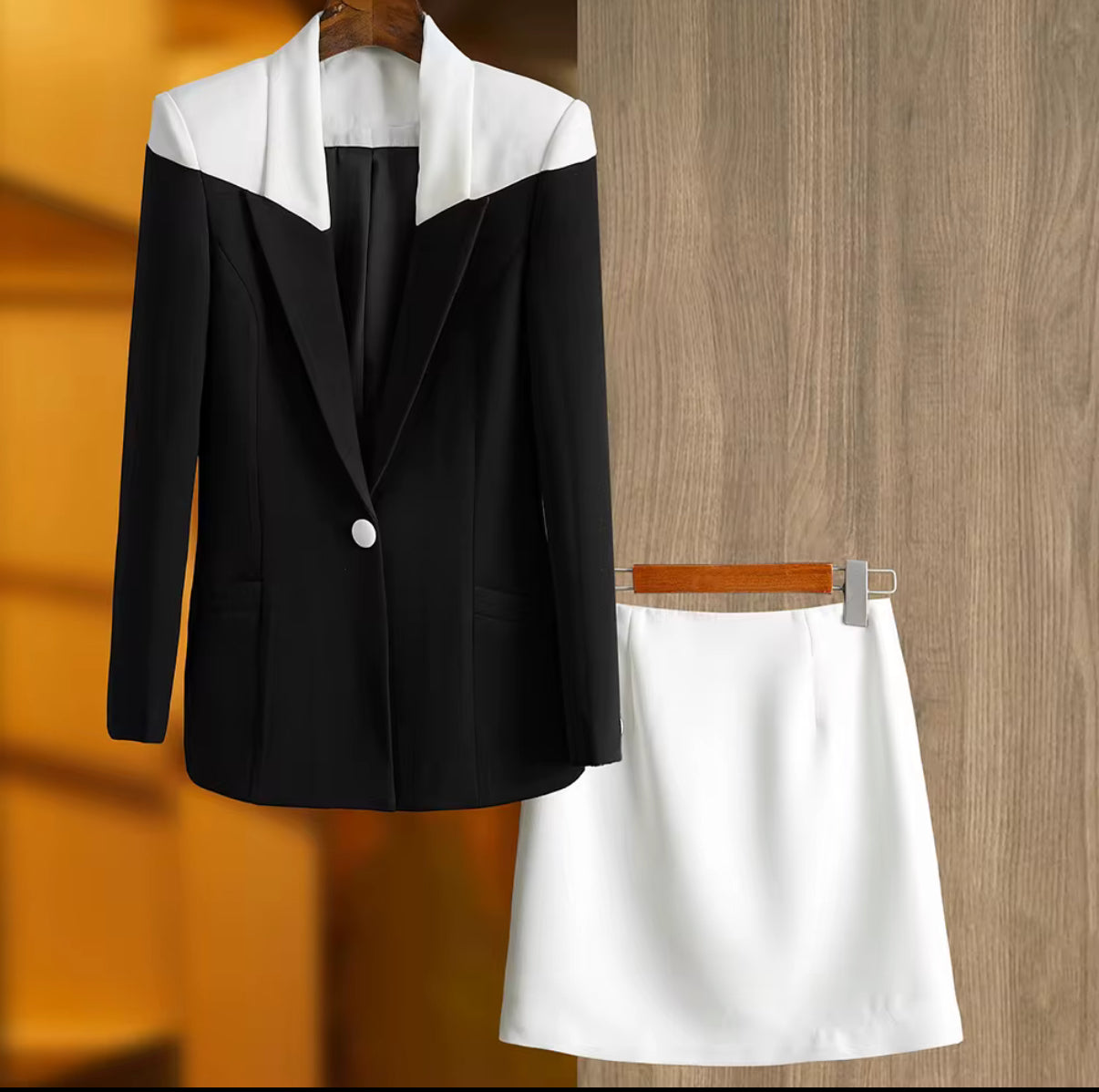 black blazer with white lapel & skirt