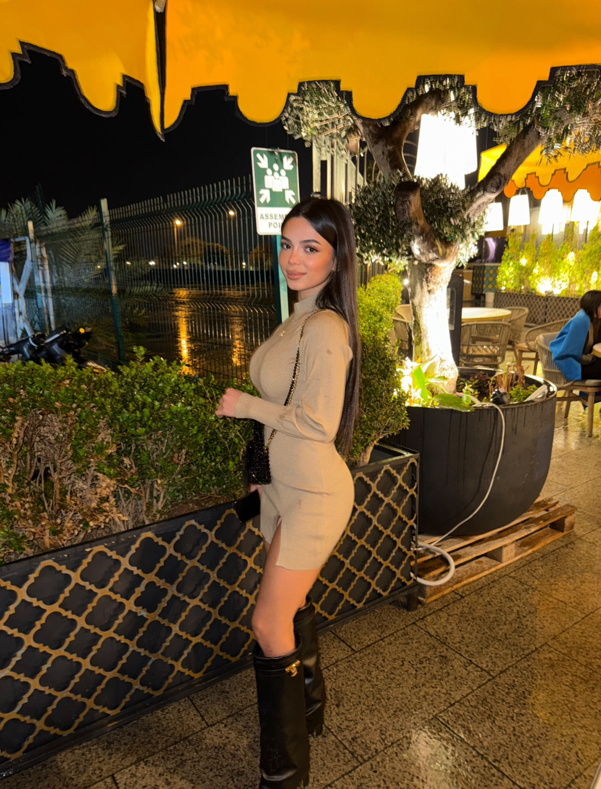 bodycon turtleneck dress with thigh-high slit