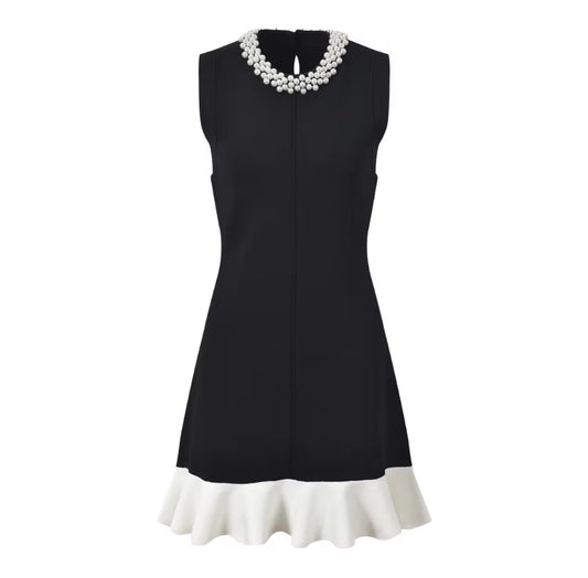 Sleeveless Black Mini Dress with White Ruffle Hem